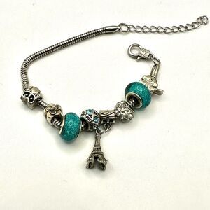 Green beaded rhinestone Eiffel Tower shamrock owl charm bracelet